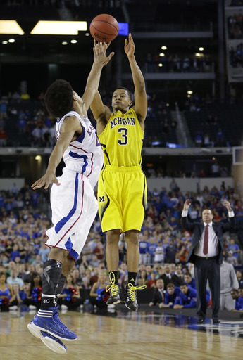 Poole's shot for Michigan draws comparisons to Burke's