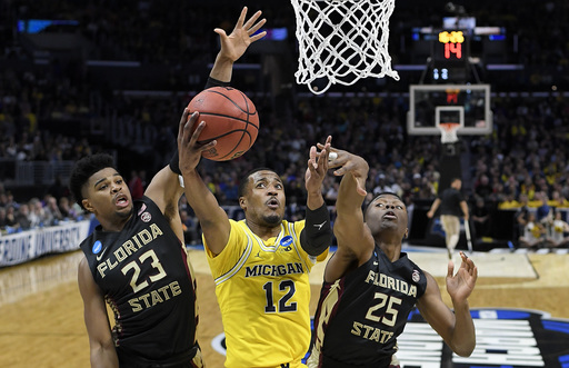 Michigan heads to Final Four in role of upset stopper