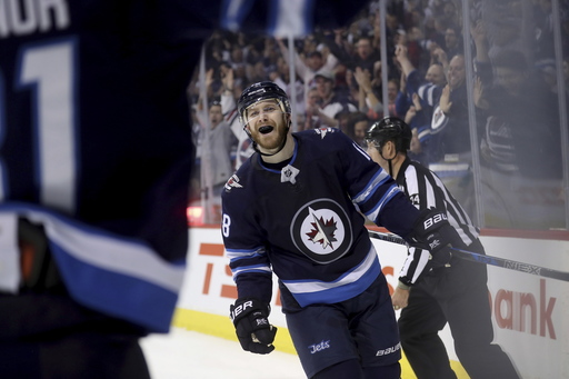 Jets clinch playoff spot with shootout win over Predators