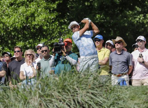 Poulter shares lead in Houston, keeps Masters hopes alive