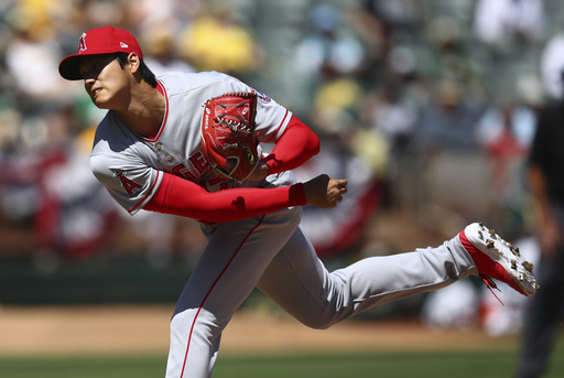 Ohtani wins pitching debut, leads Angels over A’s 7-4