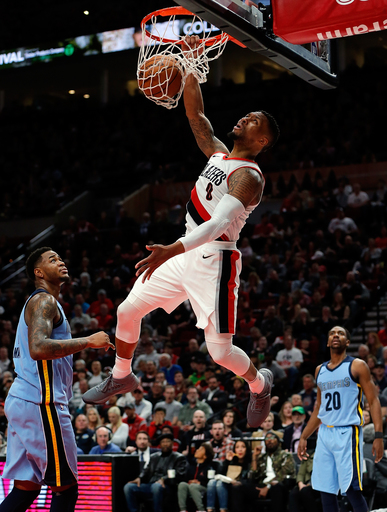 Blazers clinch playoff spot, then beat Grizzlies 113-98