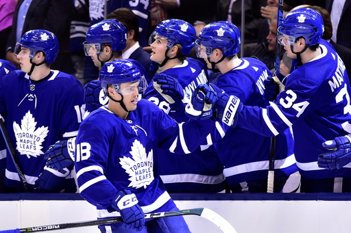 Maple Leafs beat Sabres 5-2, tie franchise mark for points