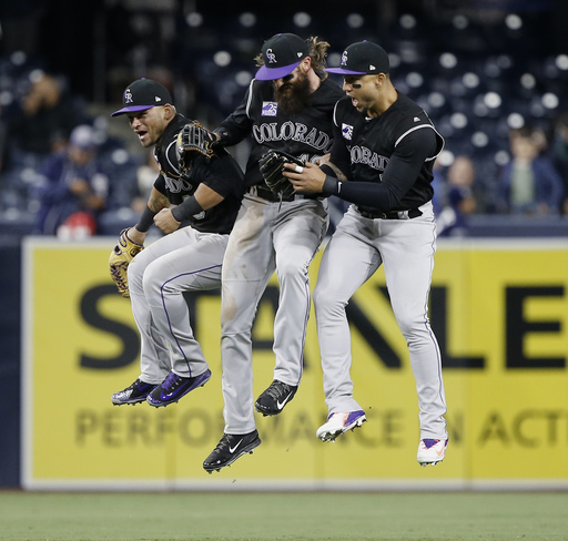 Rockies hit 3 home runs to beat winless Padres 7-4