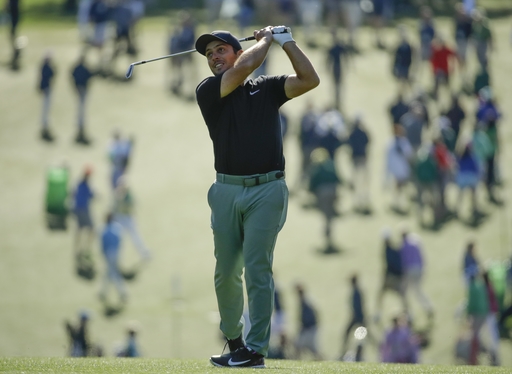 Molinari holds off McIlroy to win by 2 shots at Wentworth