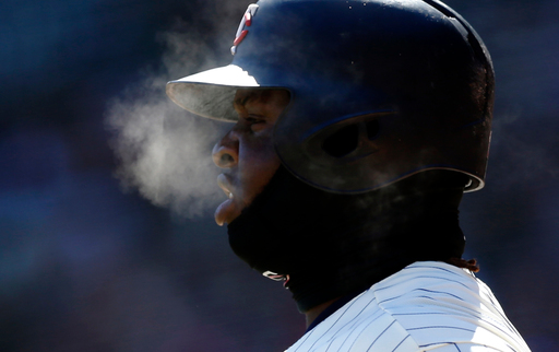 Just Chillin': Players, fans and dogs bundle up at MLB parks