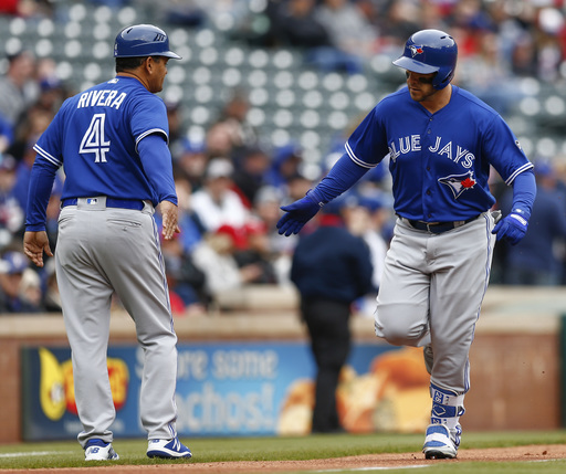 Blue Jays homer twice off Hamels in 1st, beat Rangers 7-4