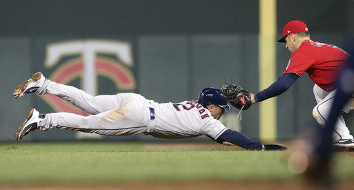 Odorizzi gets first Minnesota win, Twins top Astros 4-1