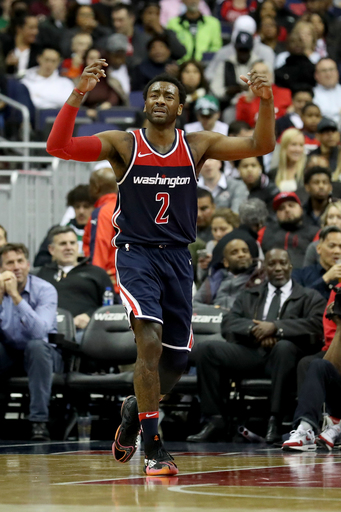 John Wall reaches 5K assists, Wizards beat Celtics 113-101