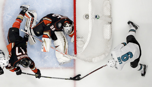 Kane scores 2 goals in playoff debut, Sharks top Ducks 3-0