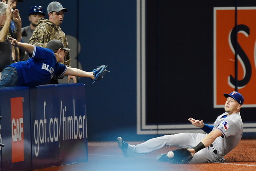 Blue Jays hit three HRs, beat Rangers 7-2 to avoid sweep