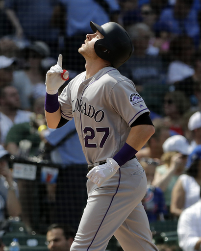 Arenado hits 2 HRs to back Anderson, Rockies pound Cubs 11-2