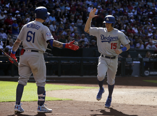 Dodgers rally on pair of wild pitches, beat D-backs 5-2