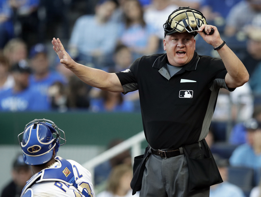 Royals bail out ballboy by rallying for 4-2 win over Tigers