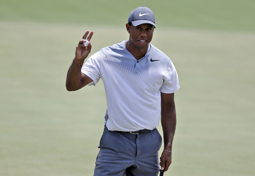 Heat of Tigermania leaves Woods’ playing partner shivering