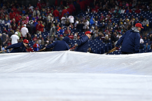 Mets-Phillies postponed by rain after 1-hour delay.