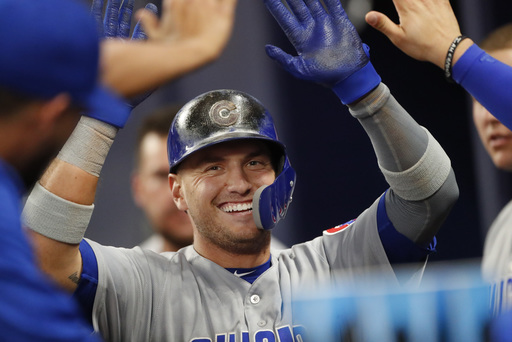 Cubs throw out 2 runner at home, rally to beat Braves 3-2