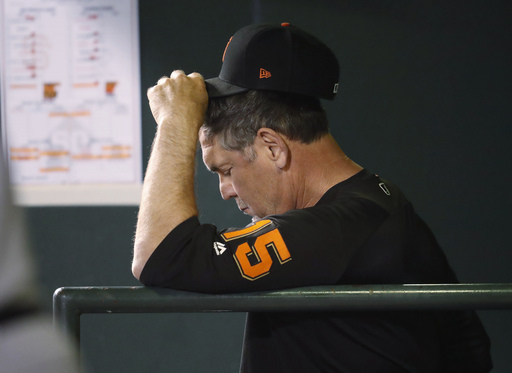 Giants lose 2 pitchers to injury in 11-4 loss to Rockies