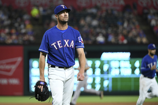 Gattis and Cole lead Astros past Rangers 5-2