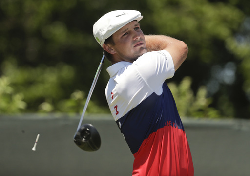 Late birdie blitz keeps DeChambeau in front at European Open