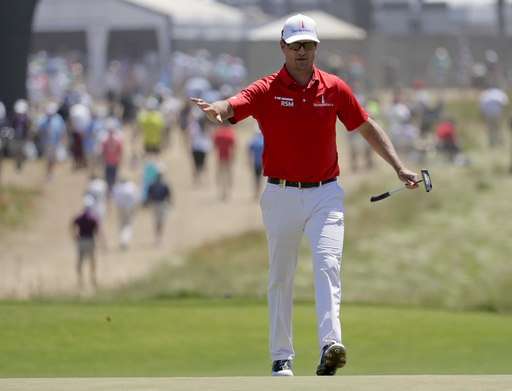 Zach Johnson holds early lead at Travelers Championship