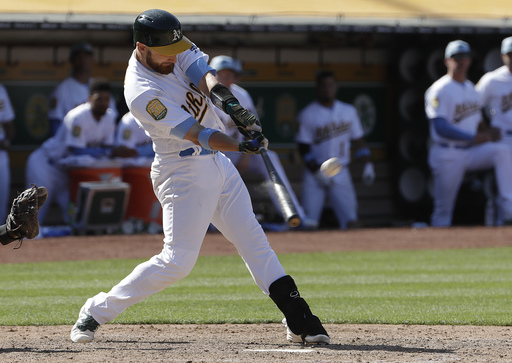 Lucroy’s RBI single in 11th send Athletics past Angels 6-5