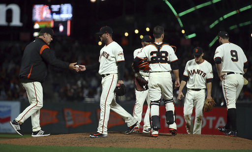 Strickland breaks pitching hand punching door in frustration