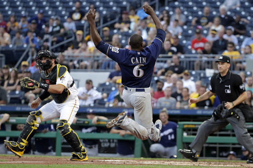 Rookie Peralta leads Brewers by Pirates 3-2