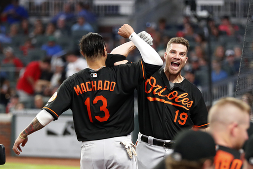 Machado hits 2-run HR in 15th as Orioles beat Braves 10-7