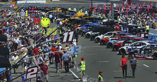 The Latest: Truex takes early lead from Larson in Sonoma