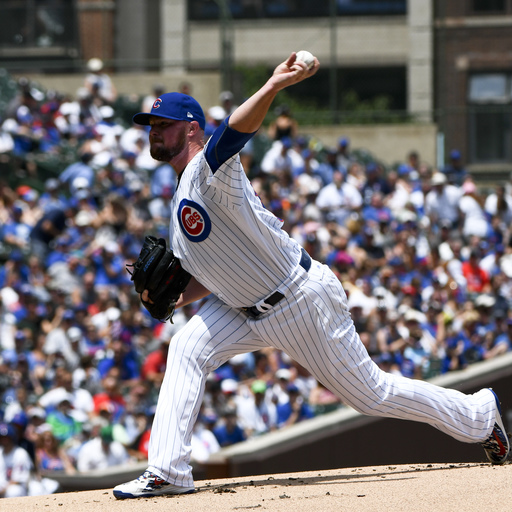 Jon Lester stars on bound and at plate for Cubs