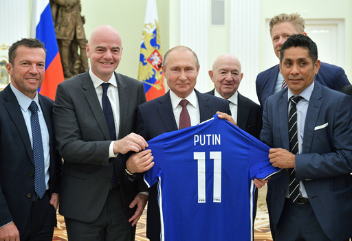 Column: Infantino fawns over Putin, politicizes soccer body