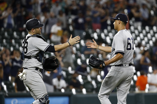 Yankees split doubleheader with Orioles