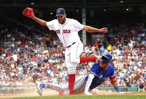 LHP Rodriguez leaves game with injury after tumbling