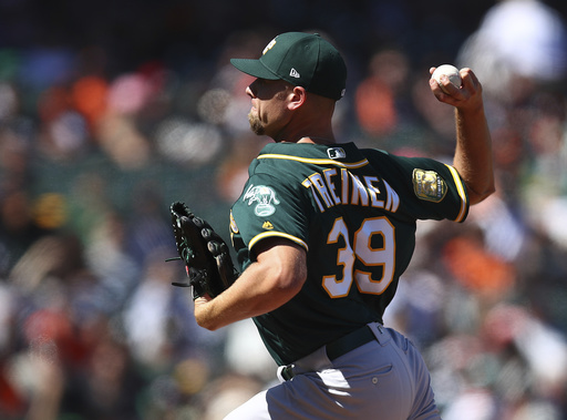Success on the road lifts A's into contention