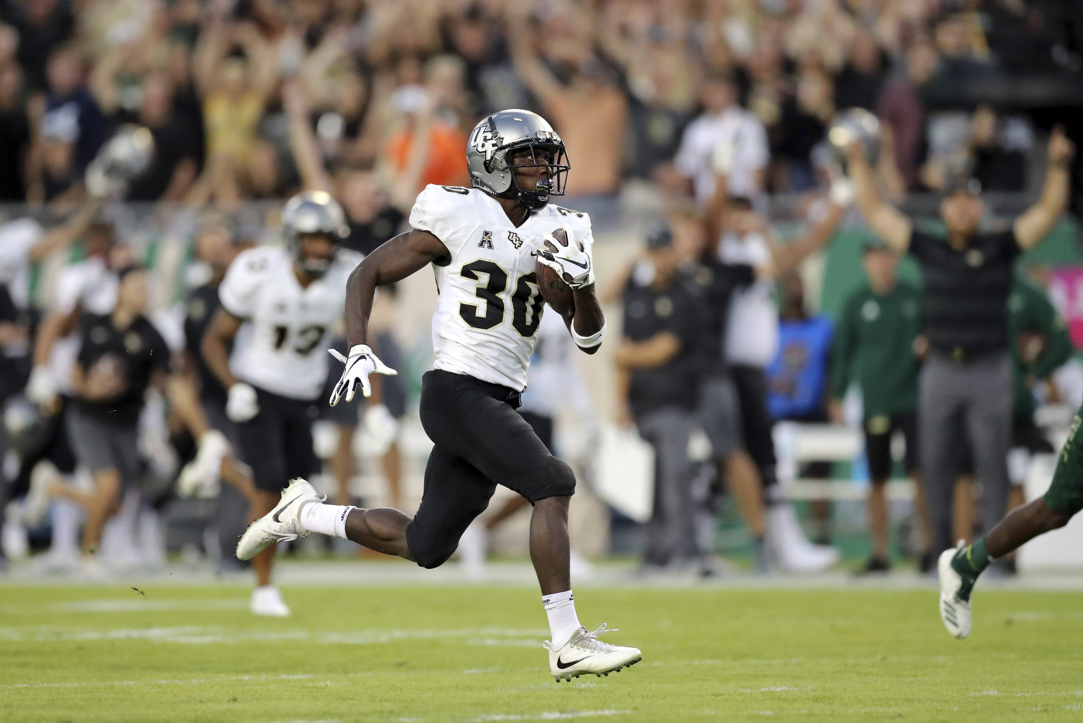 No. 8 UCF remains unbeaten, but loses QB Milton in 38-10 win