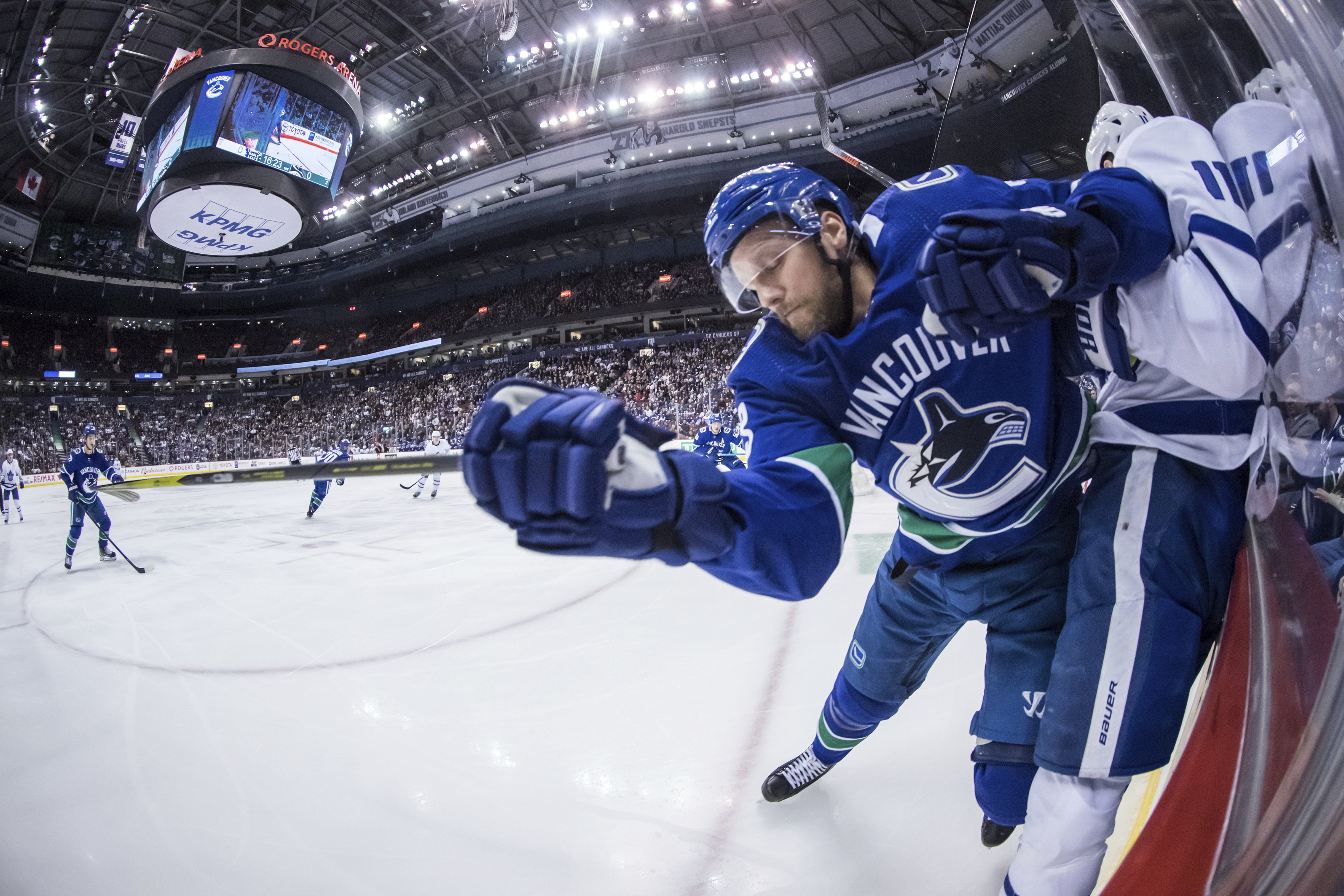 Edler scores in OT, Canucks rally to beat Maple Leafs 3-2