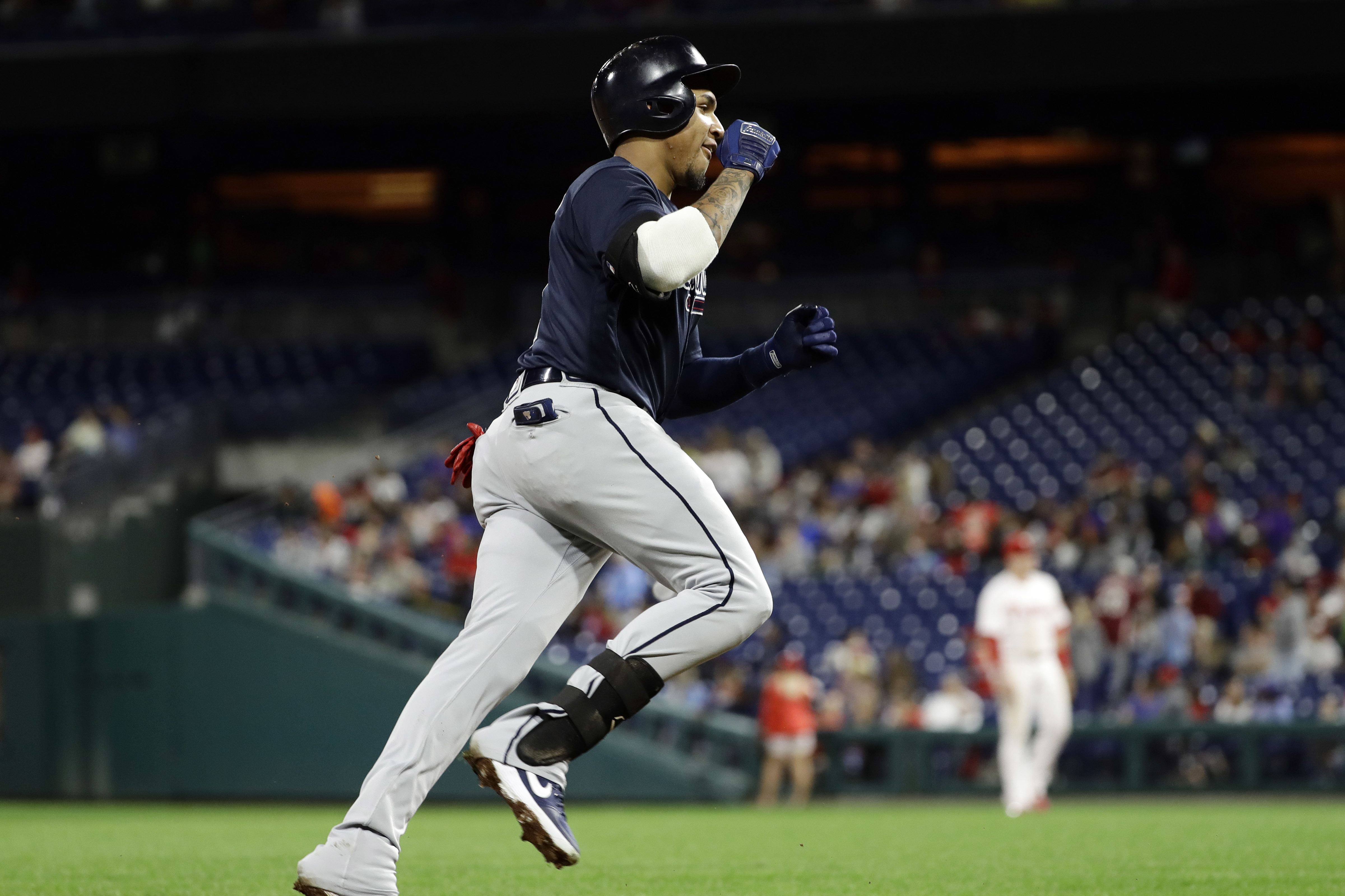 Freeman, Braves rout Phils 10-2, push for playoff home field