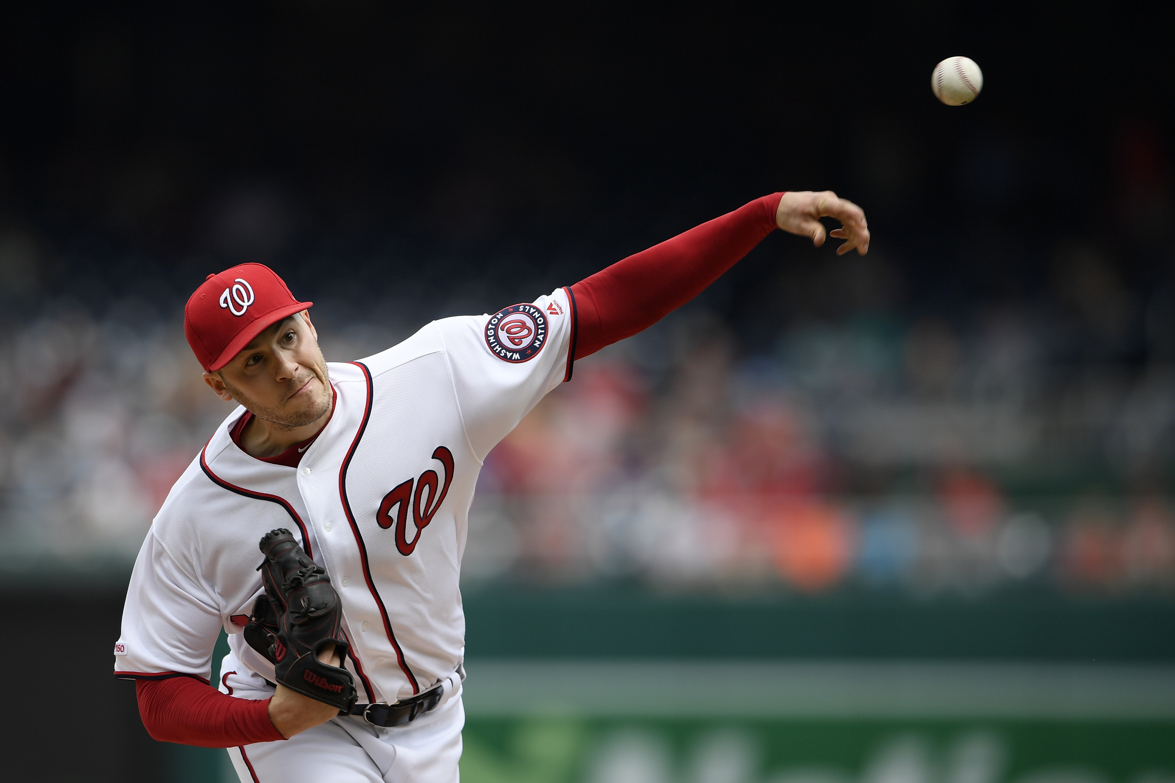 Corbin earns 1st win with Nationals, beats Giants 4-2