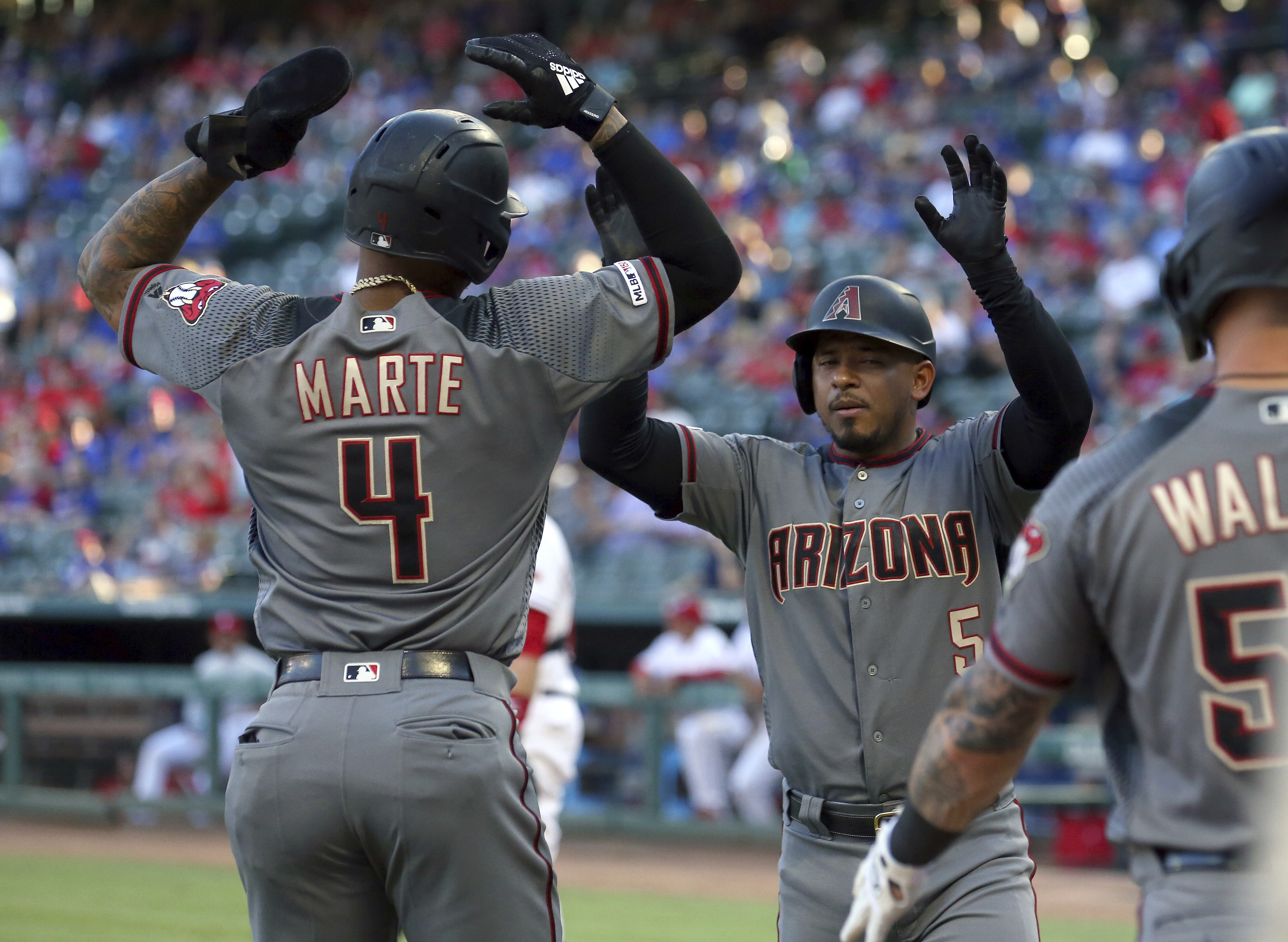 D'backs tie franchise record with 21 hits, beat Rangers 19-4