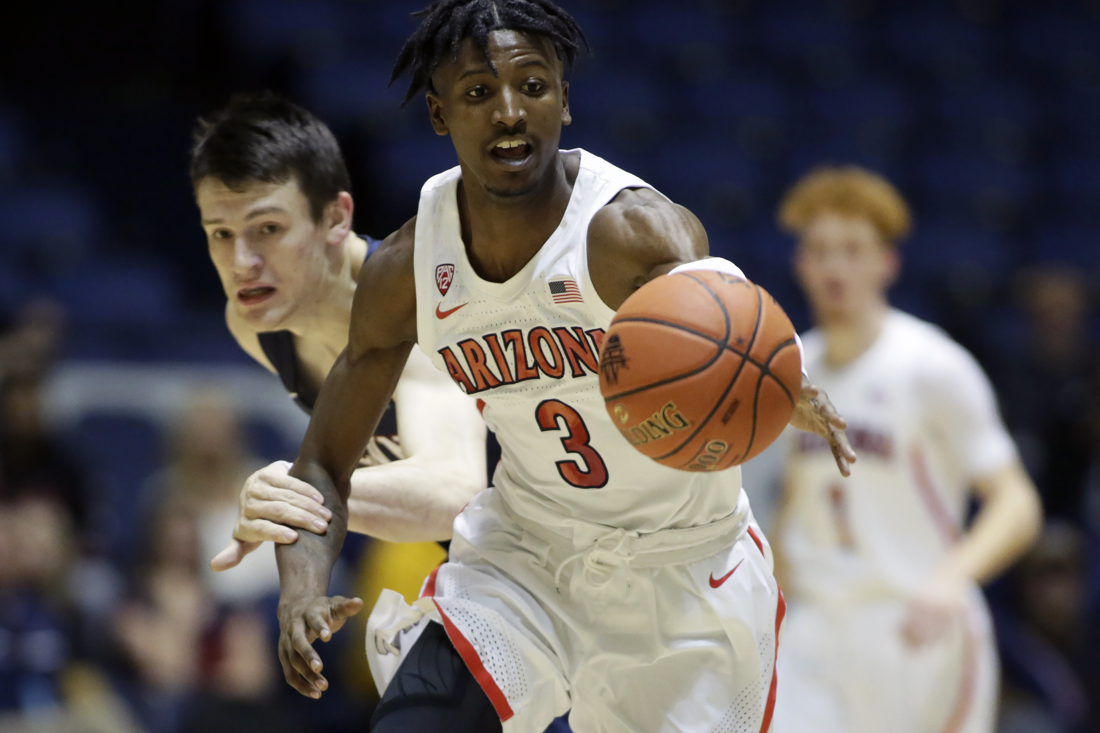 Mannion leads No. 14 Arizona to 92-82 victory over Penn