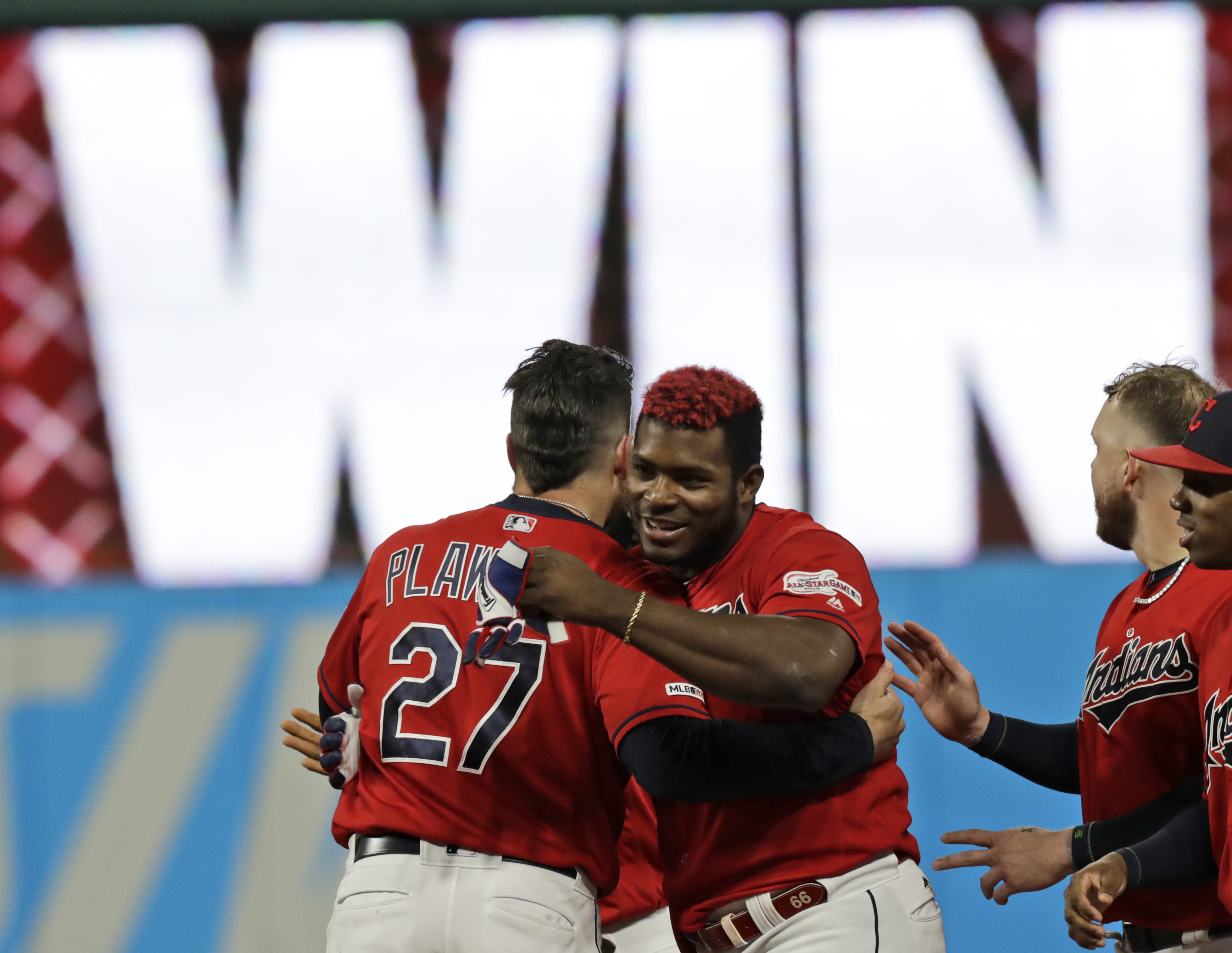 Puig's single in 10th lifts Indians over Tigers 2-1