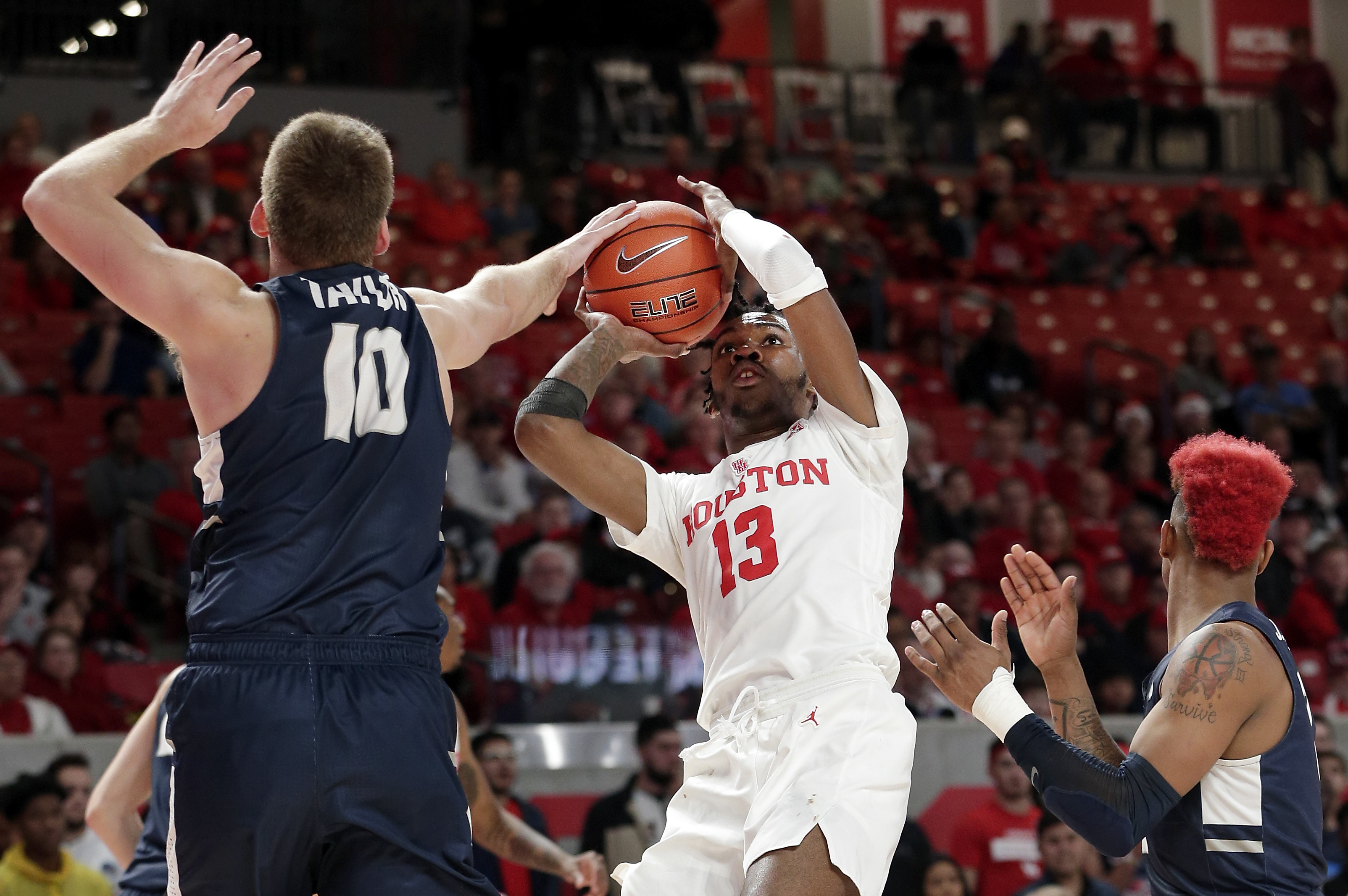 Brooks, No. 21 Houston rally for 60-50 win over Utah State