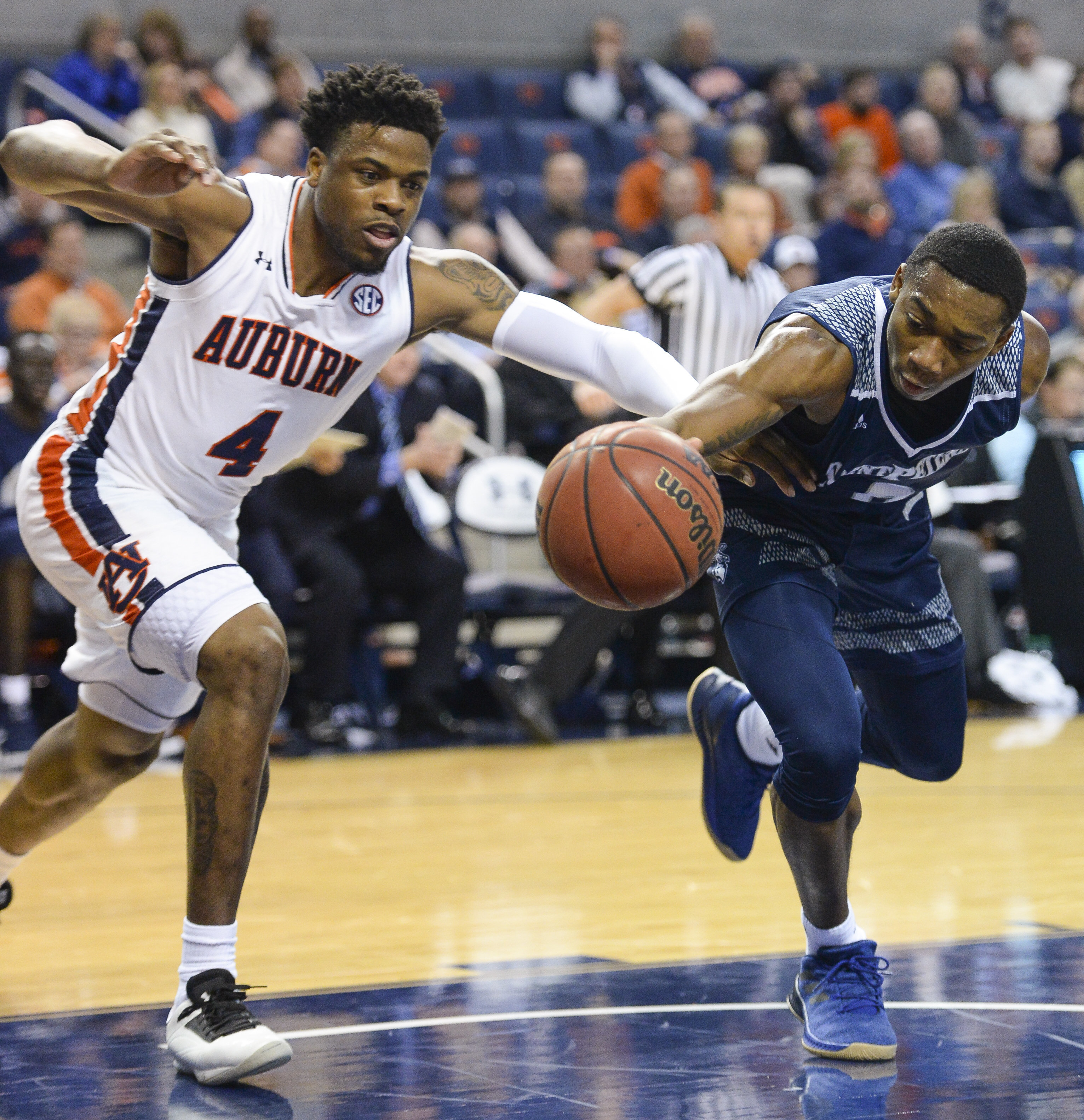 Brown, McLemore lead Auburn 99-49 rout of Saint Peter’s