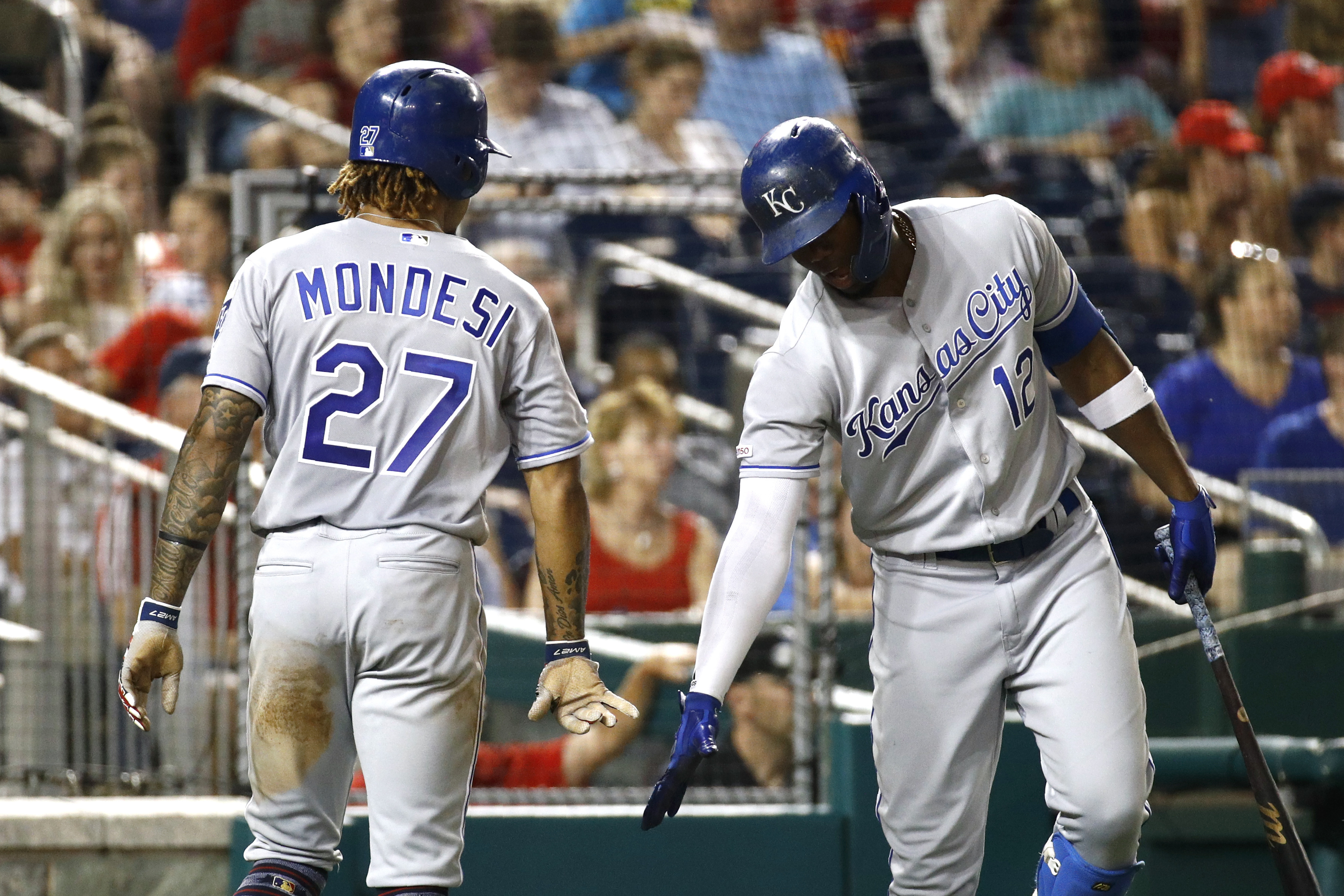 Royals score 3 in 11th inning to outlast Nationals 7-4