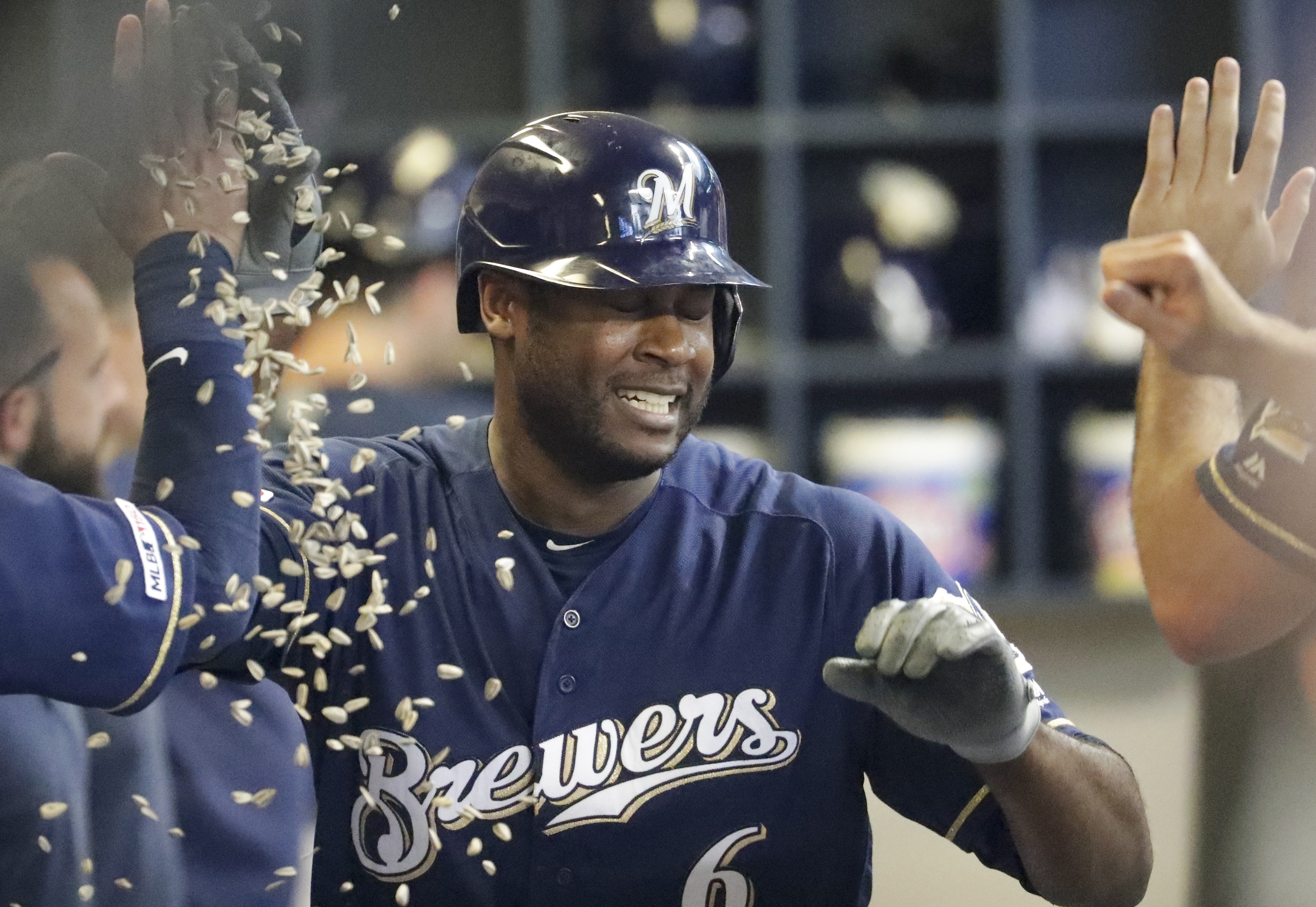 Cain HR, Brewers fan 16, beat Padres 5-1 to improve position