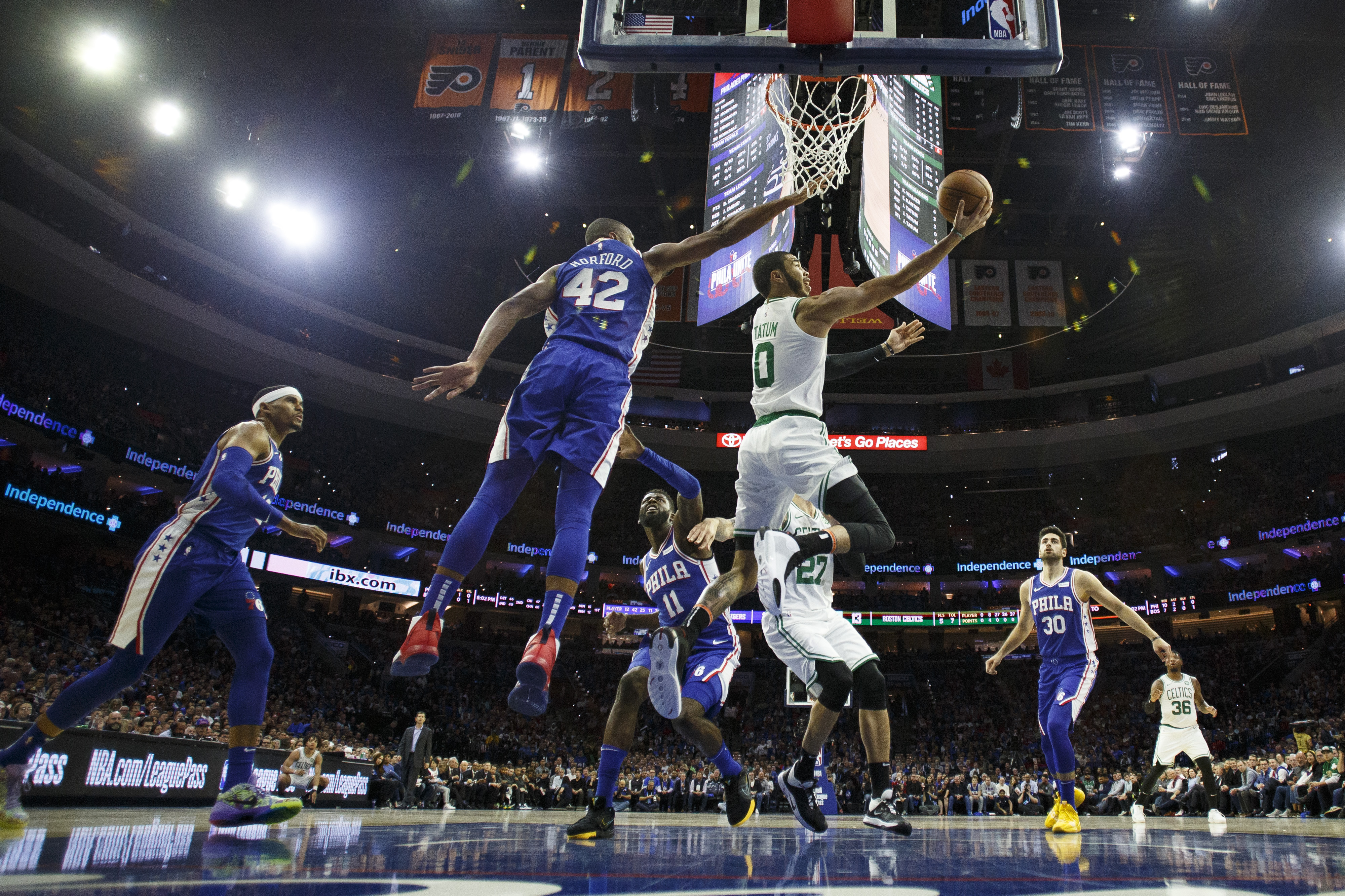 76ers top Celtics 107-93 in 1st battle of East favorites