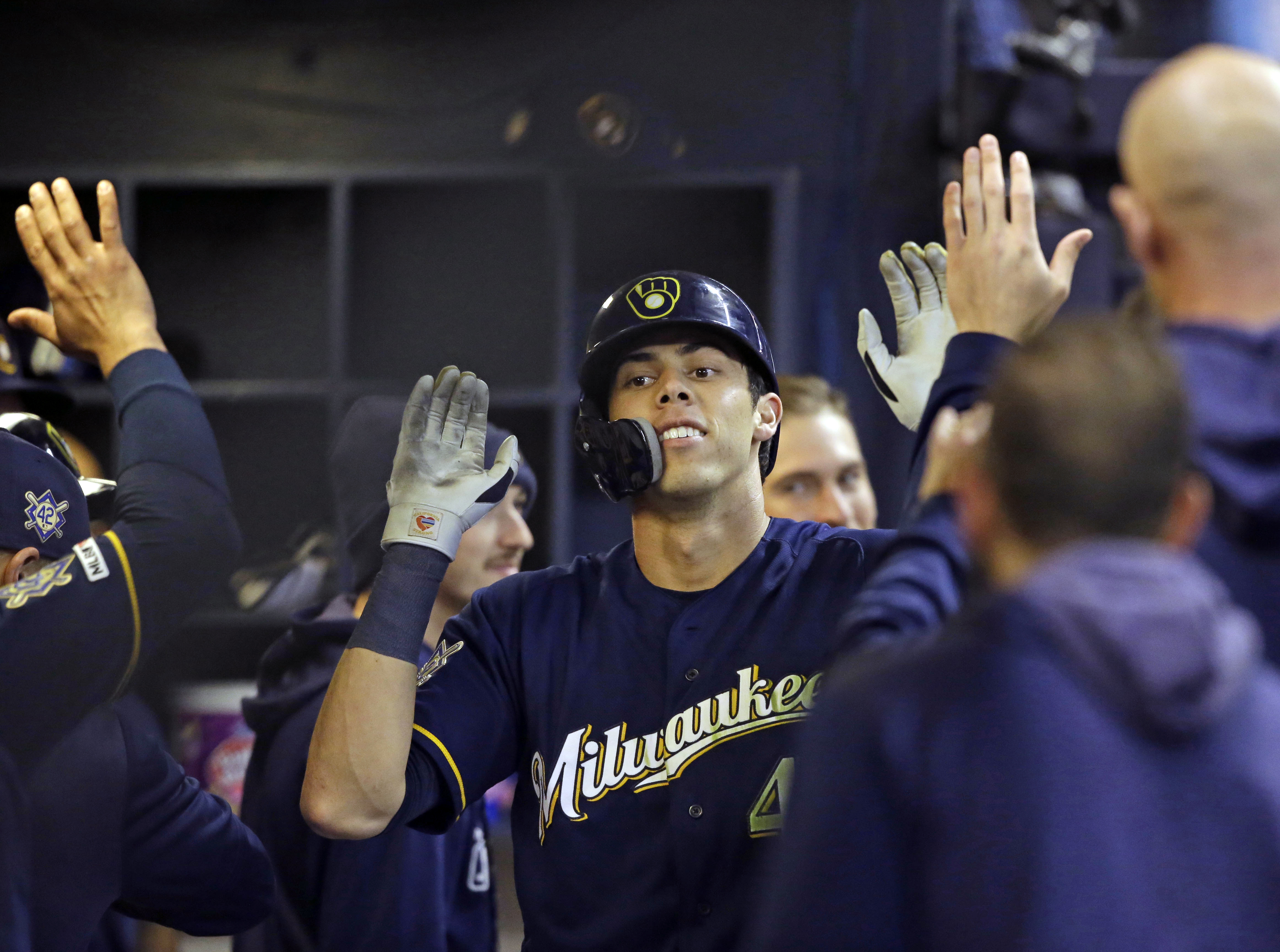 Yelich’s 3 homers lift Brewers past Cardinals, 10-7