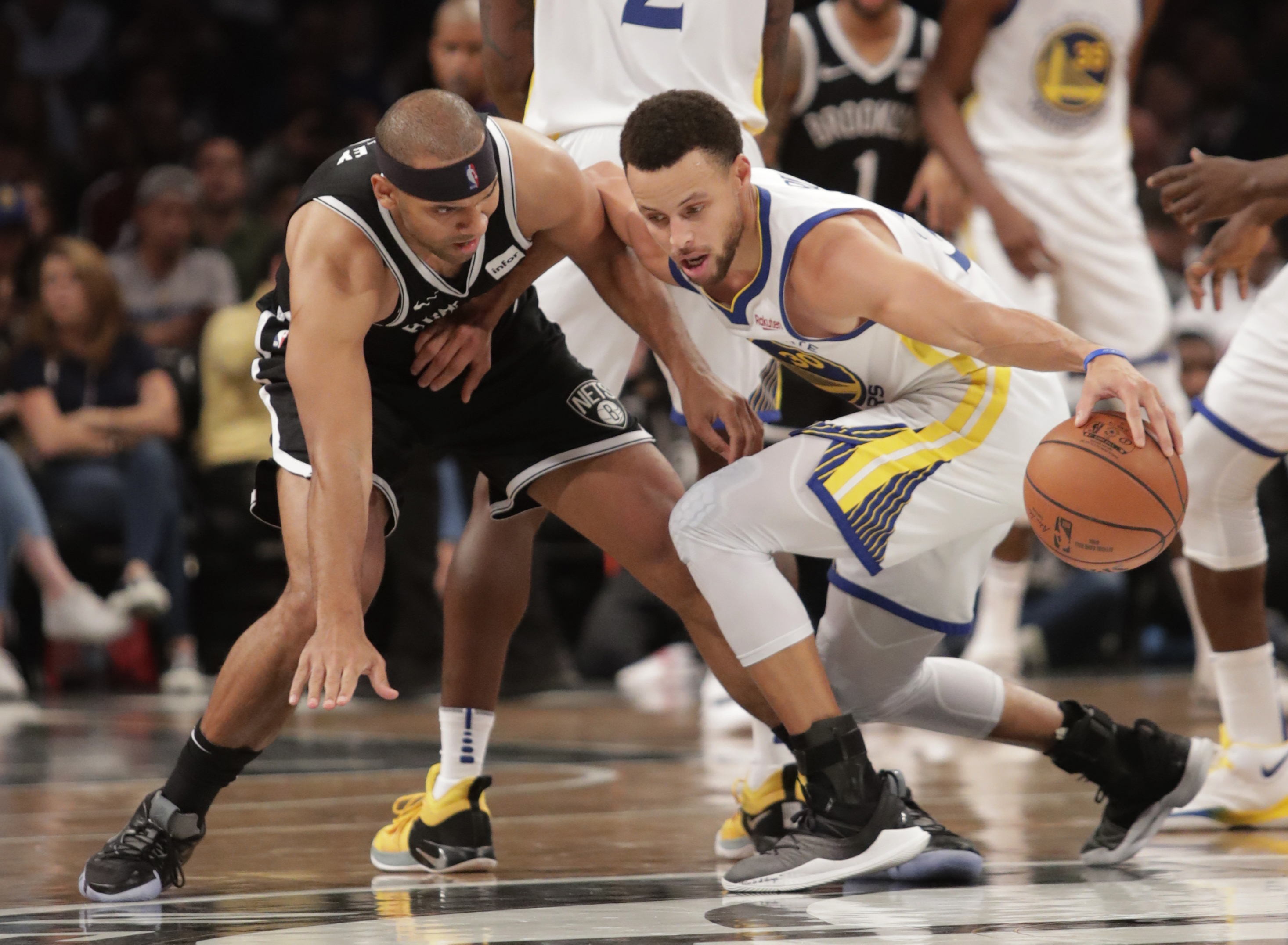 Curry’s 3-pointers carry Golden State past Nets 120-114