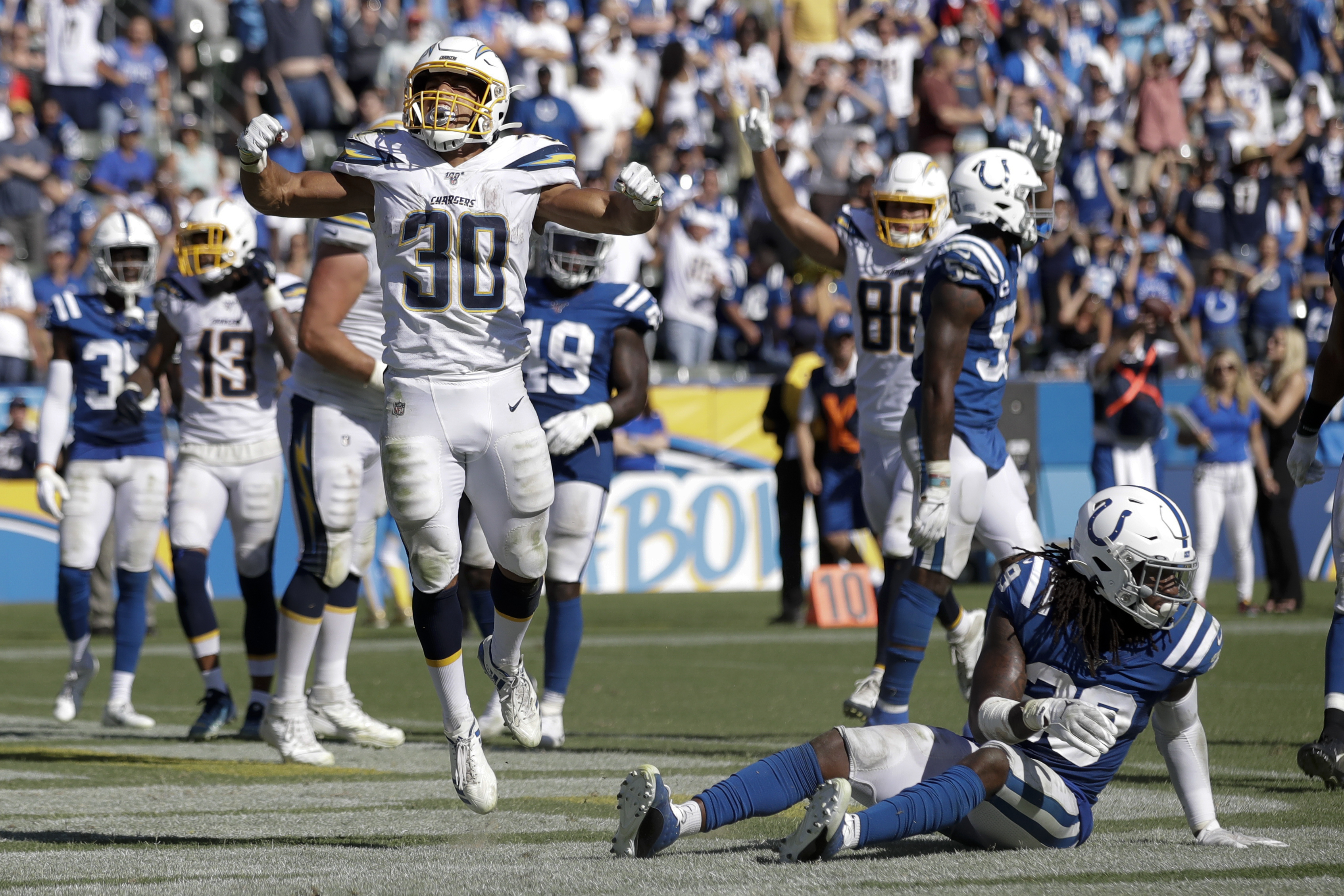 Ekeler scores 3 TDs in Chargers' 30-24 OT win over Colts